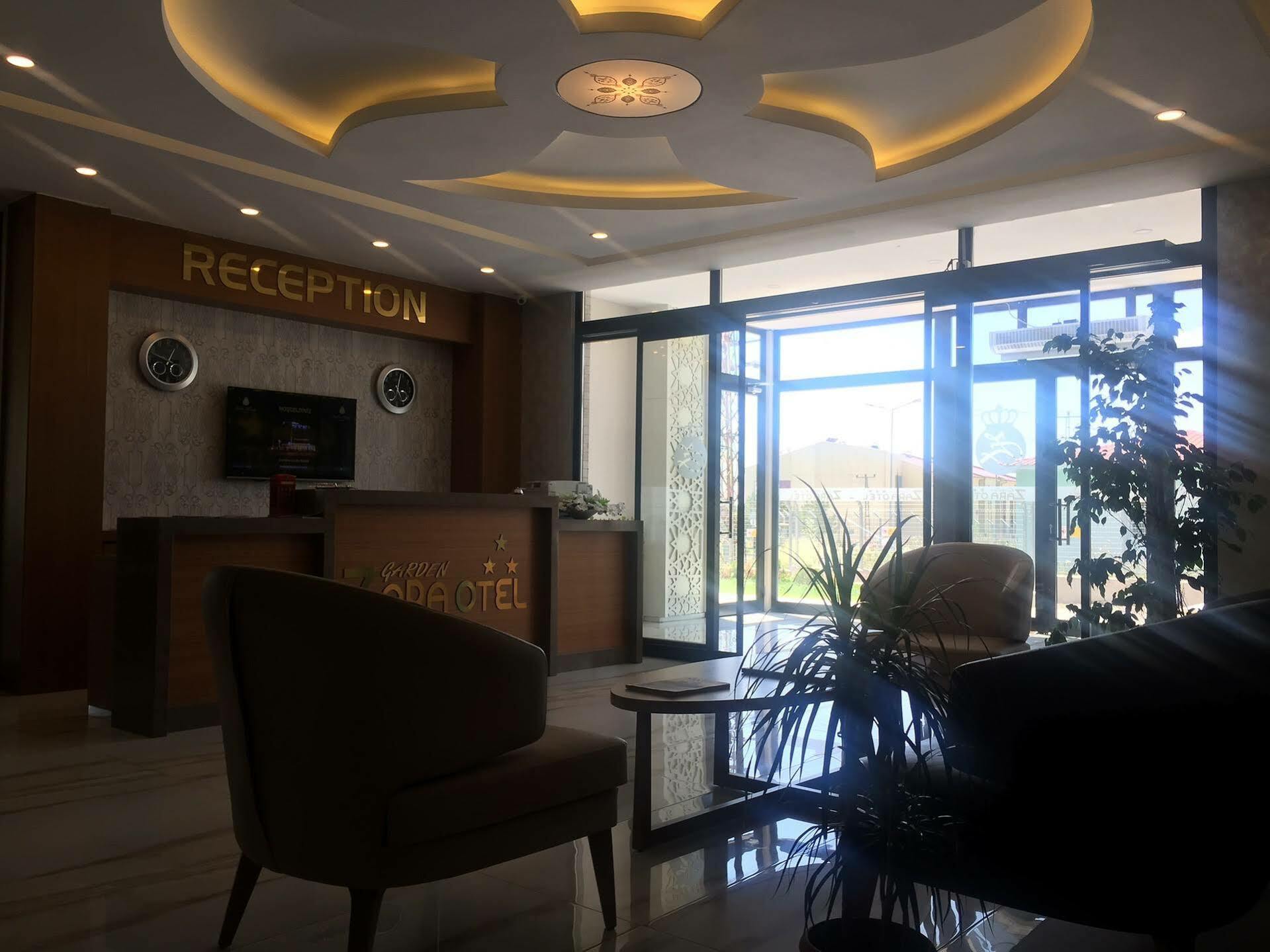 Garden Zara Hotel Restaurant Cafe Exterior foto