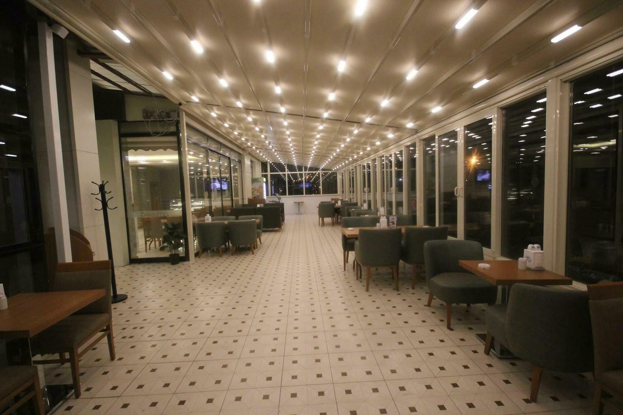 Garden Zara Hotel Restaurant Cafe Exterior foto